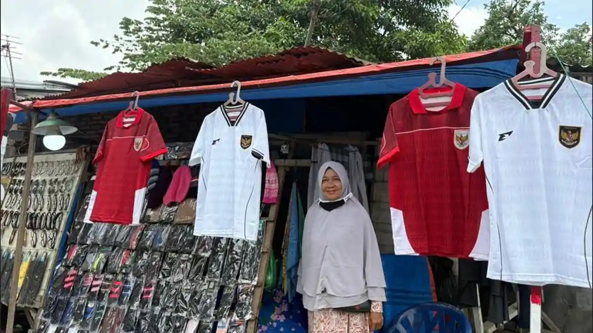 SeorangPedagangbajuje...danKecamatanMedanBarat